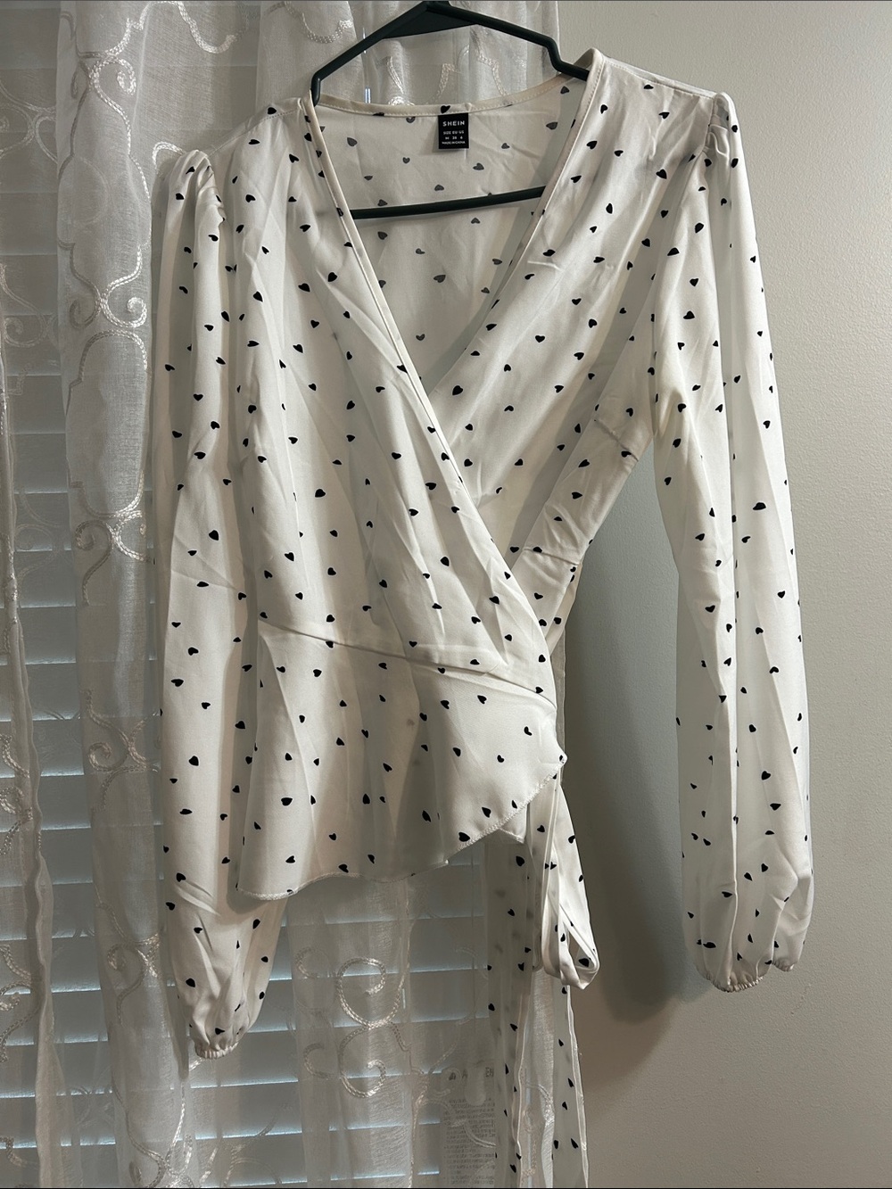 Cream Faux-Wrap Blouse with Black Heart Print